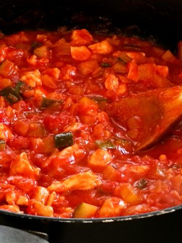 Spaghetti sauce in a pan.