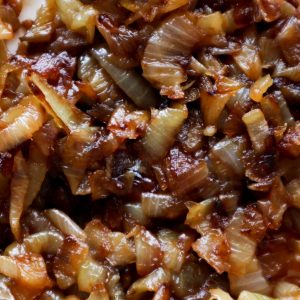 An overhead shot of caramelized onions.