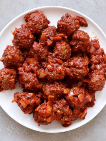 Overhead shot of Spanish meatballs in tomatosauce.