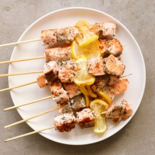 Overhead shot of salmon skewers.