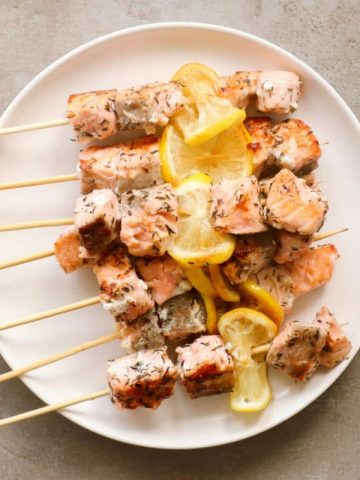 Overhead shot of salmon skewers.
