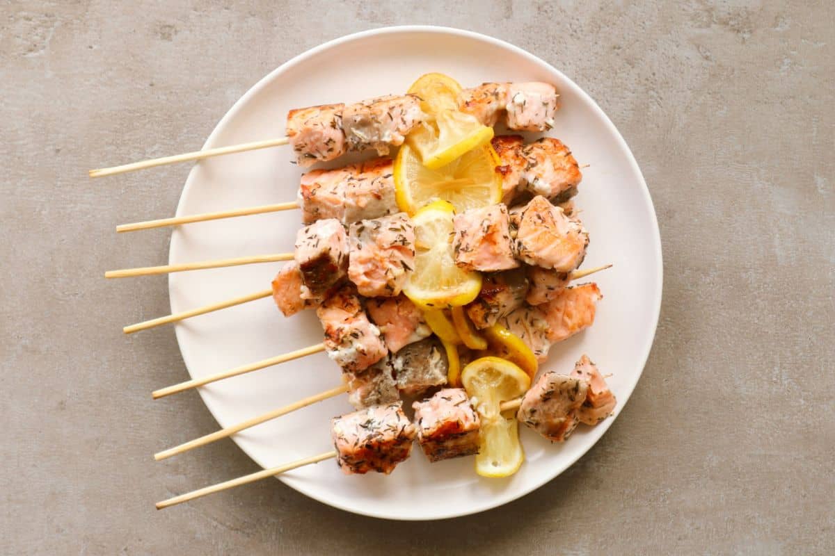 Overhead shot of salmon skewers.