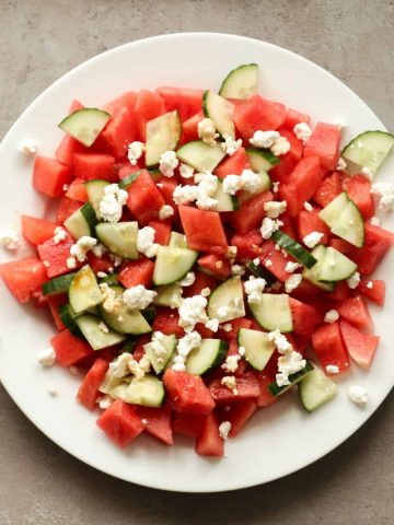 Watermelon salad with feta and mint on a plate.