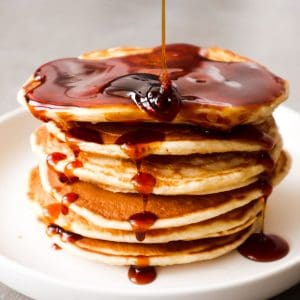 Side shot of 3 ingredient banana pancakes on a plate.