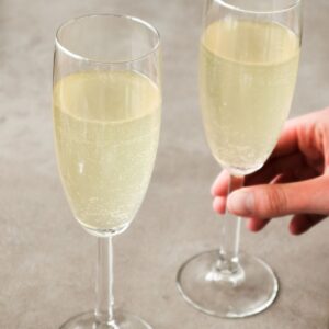 Side shot of two french 75 with vodka cocktails.
