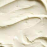 An overhead shot of white almond buttercream frostinf so you can see the texture.
