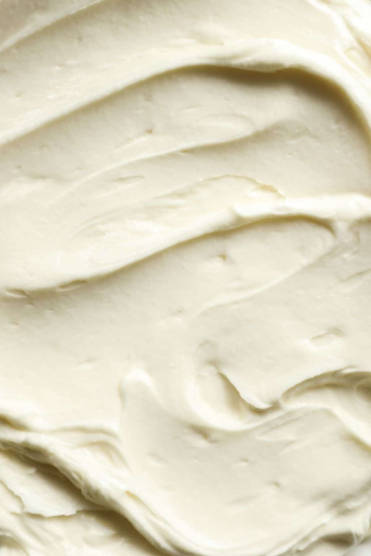 a close up of an easy buttercream frosting recipe