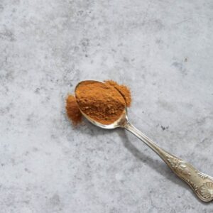 Speculaas spice mix on a spoon.
