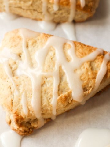 A scone with earl grey tea and a sugar glaze.