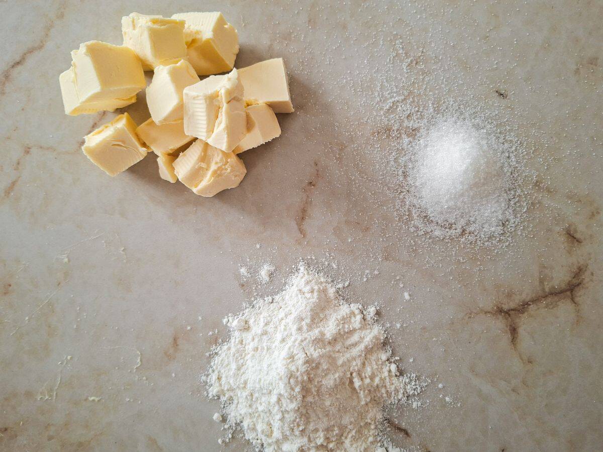 All the ingredients you need to make sand cookies.