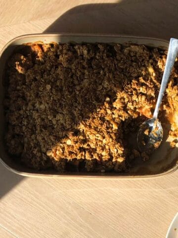 Applesauce crisp with a spoon.