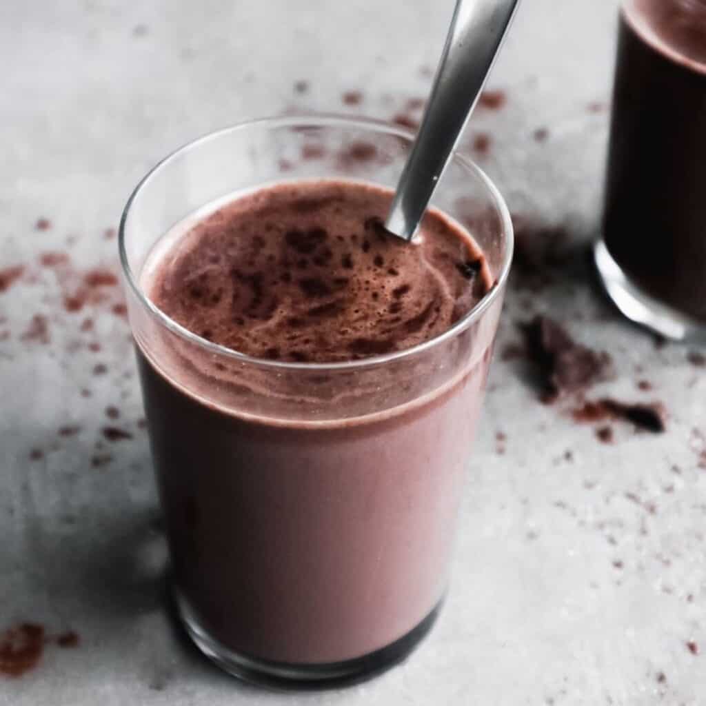 Homemade hot chocolate in a glass.
