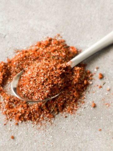 Burger seasoning on a spoon.